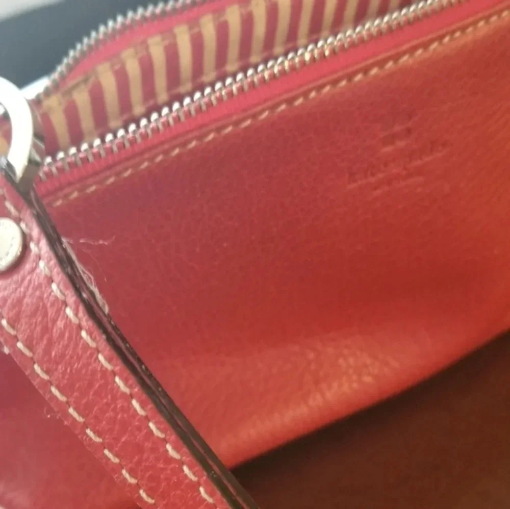 Kate Spade red pebbled leather wristlet bag